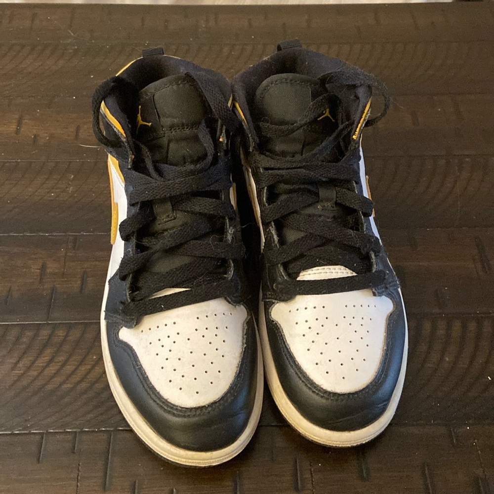 Nike Jordan 1 Mid White Black and University Gold